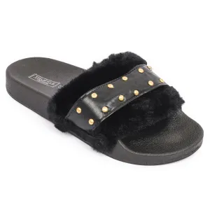Mules plates en fourrure cloutée noire