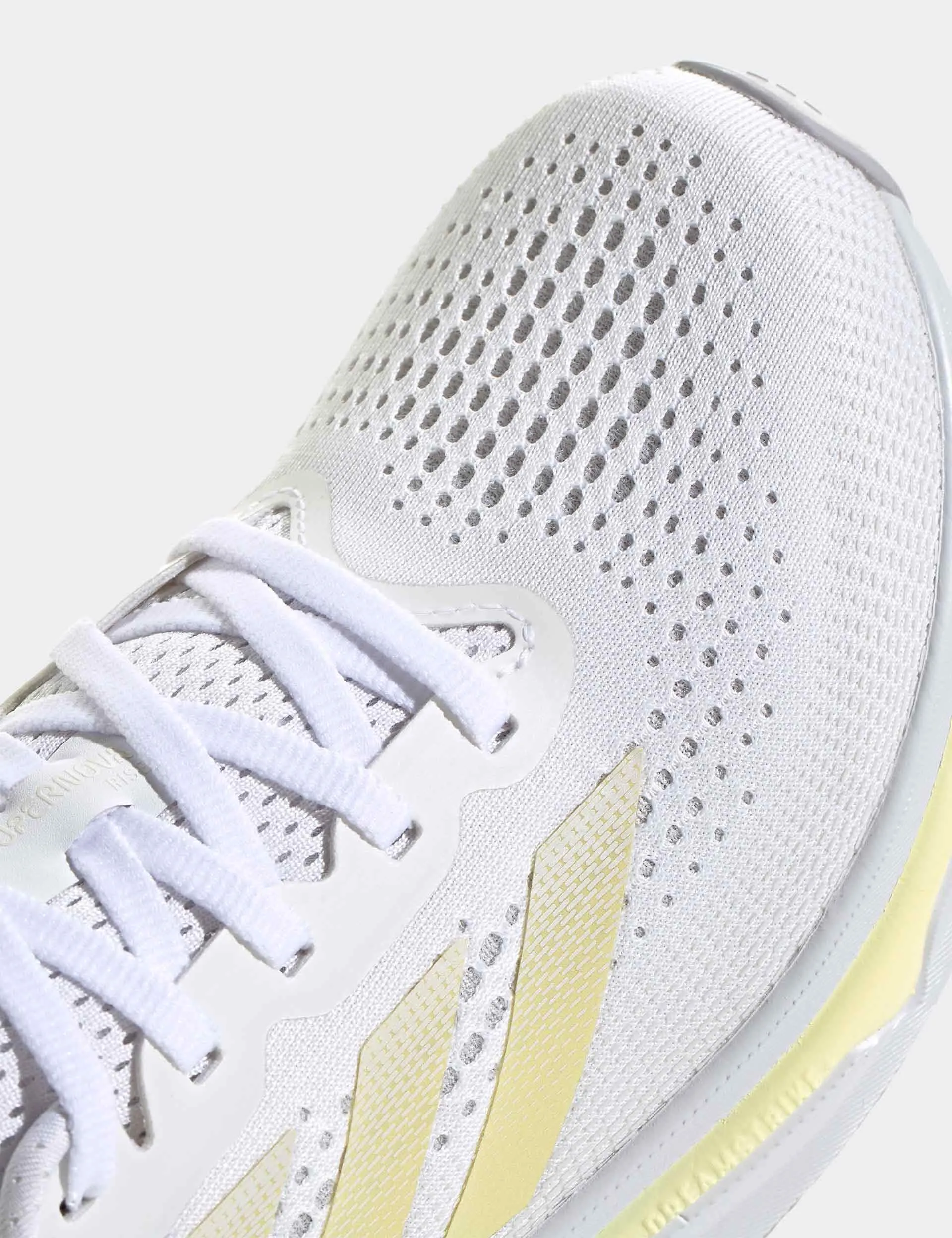 Chaussures de course Supernova Rise - Blanc nuage/Métallisé zéro/Jaune pâle