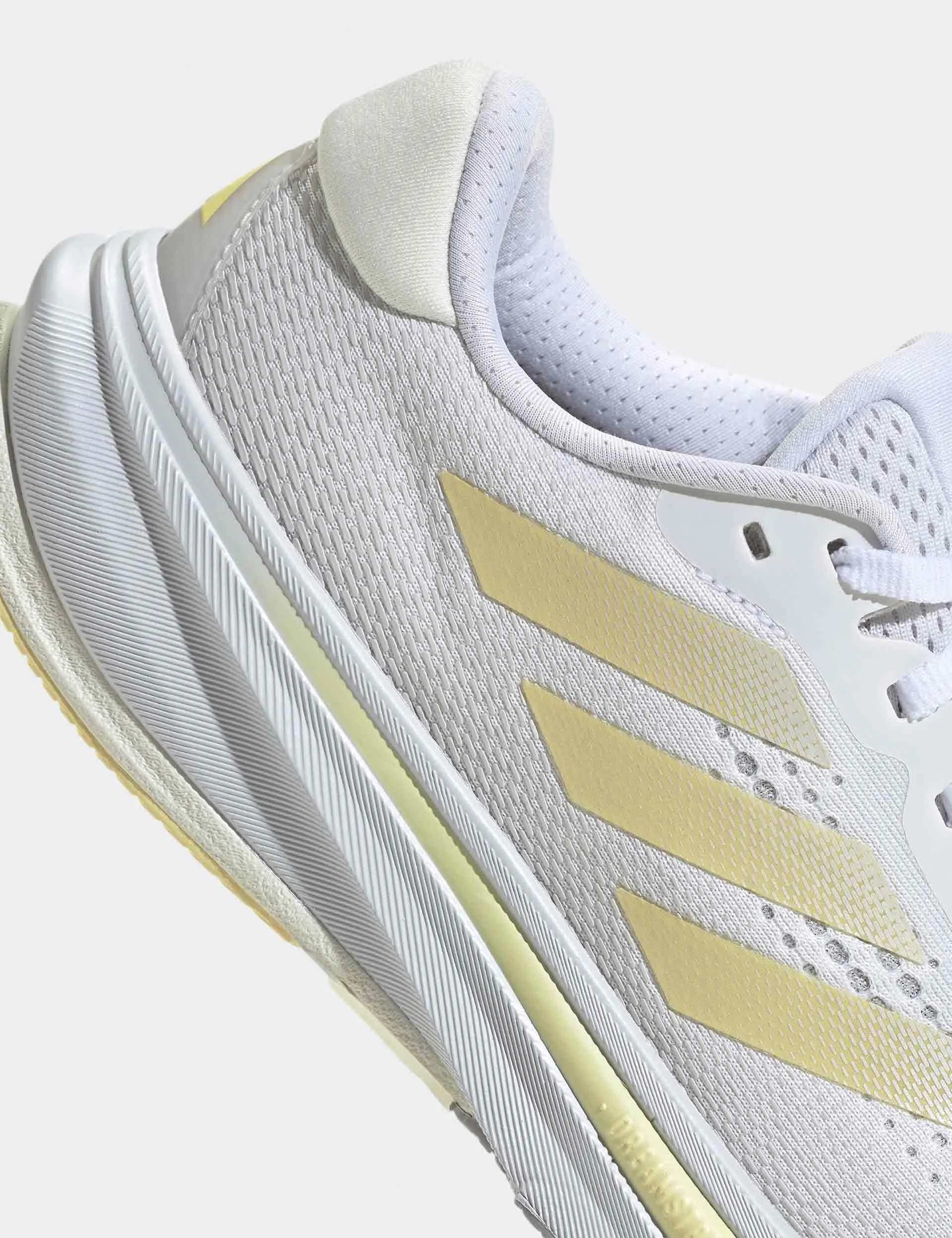 Chaussures de course Supernova Rise - Blanc nuage/Métallisé zéro/Jaune pâle
